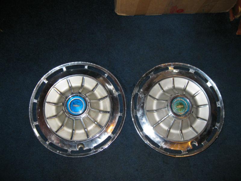 Pair of 1962   chevy impala    14" hubcaps 