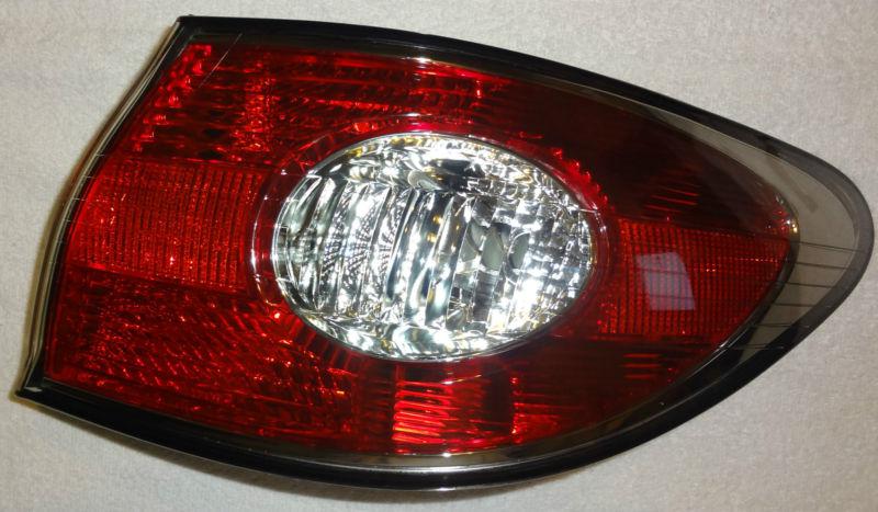 Oem lexus es330 es300 2002-2004 right/passenger side tail light housing assembly