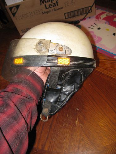 Old snowmobile helmet of bike helmet medium