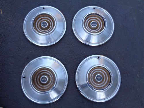 Used 1966 chrysler imperial hubcaps set of 4. good california car condition.