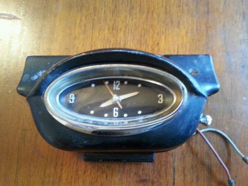 Vintage original equipment 1957 oldsmobile dash clock