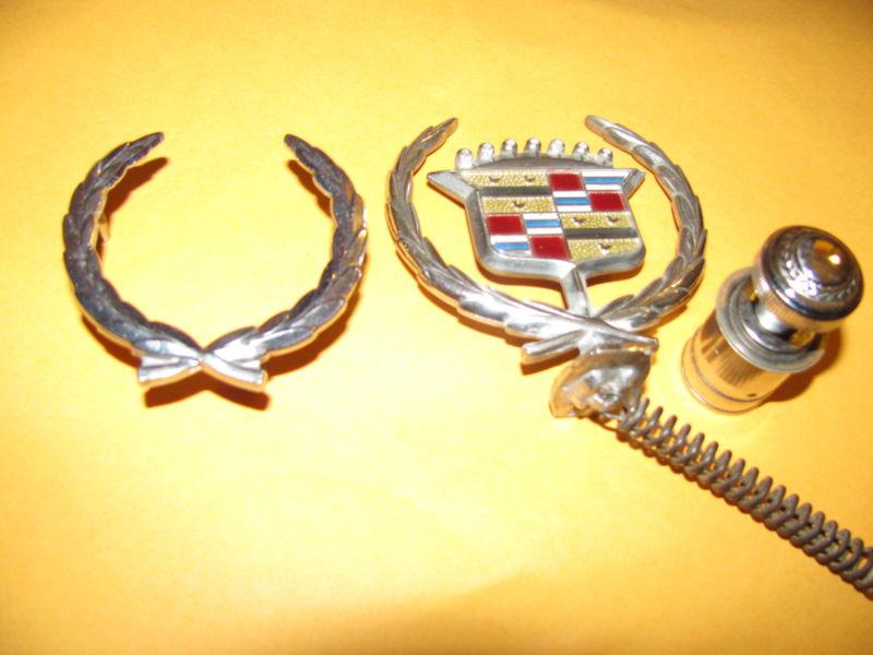 1980's cadillac ornaments and cigarette lighter hood trunk