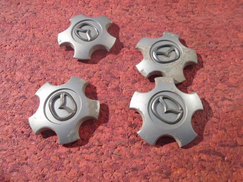 Mazda 6  or 3  set of 4 alloy wheel centre caps genuine