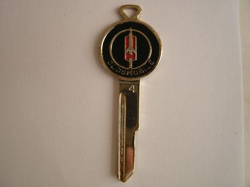 Vintage oldsmobile color crest ignition/door key blank #1345- 1969 fancy key