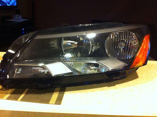 2011&up vw passat left headlight (as is)