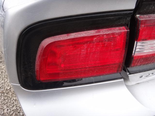 Tail light 11 12 charger, left