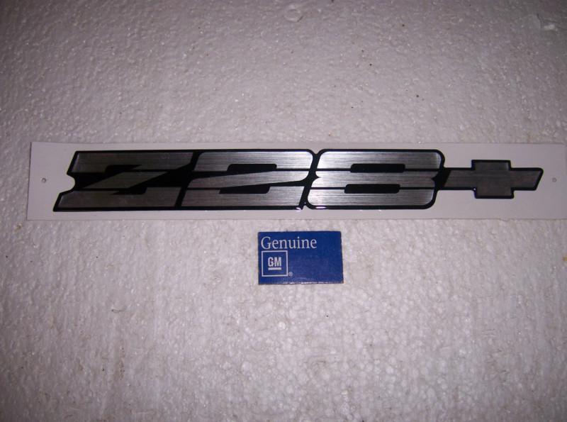 Rear bumber emblem z-28 silver gm restoration  91-92 camaro