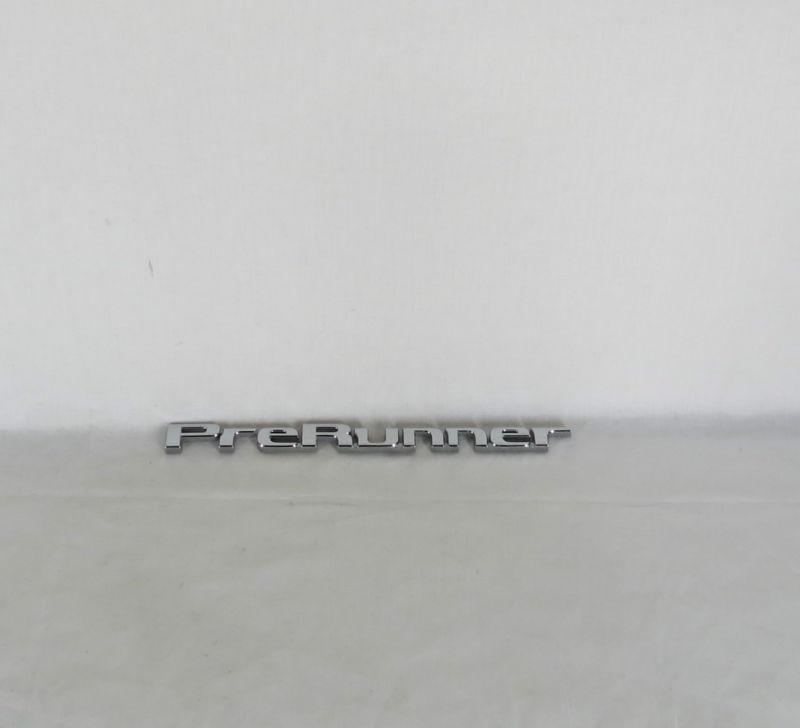 05-11 toyota tacoma prerunner rear chrome emblem nameplate sign logo symbol oem