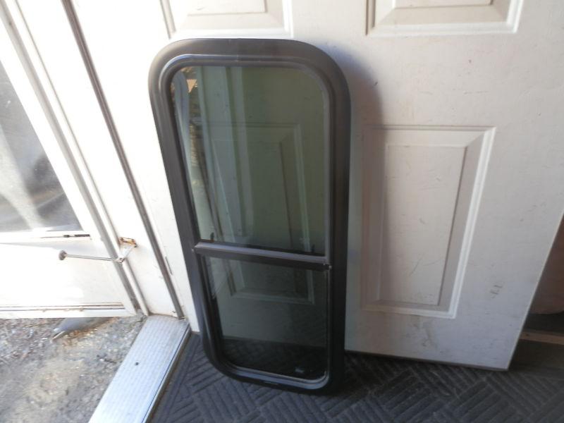 Rv black tinted up & down window r.o. 36" tall x 14" wide 