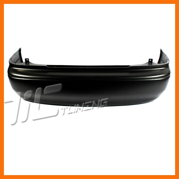 98-02 mazda 626 rear bumper facial cover primered plastic lx sedan