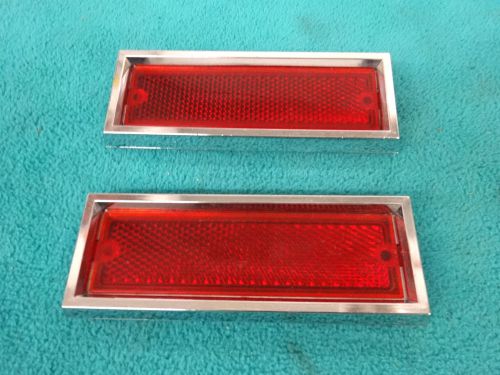 1970-71 challenger s.e. interior bot of door carpet reflector / bezel, 1-pr, vgc