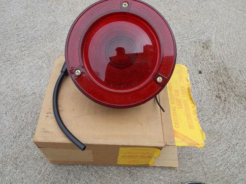 Nos 1960 - 1972 international pickup 1300 scout tail light lens housing assembly