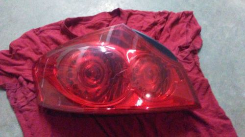 Infiniti g37 g25 10 11 12 13 14 left driver quarter panel tail light oem