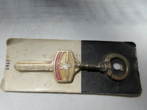 Vintage 1965 ford thunderbird key blank keychain on card