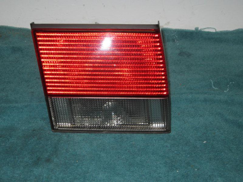 1999-2003 saab 9-3 left/driver side oem trunk tail light in great used condition