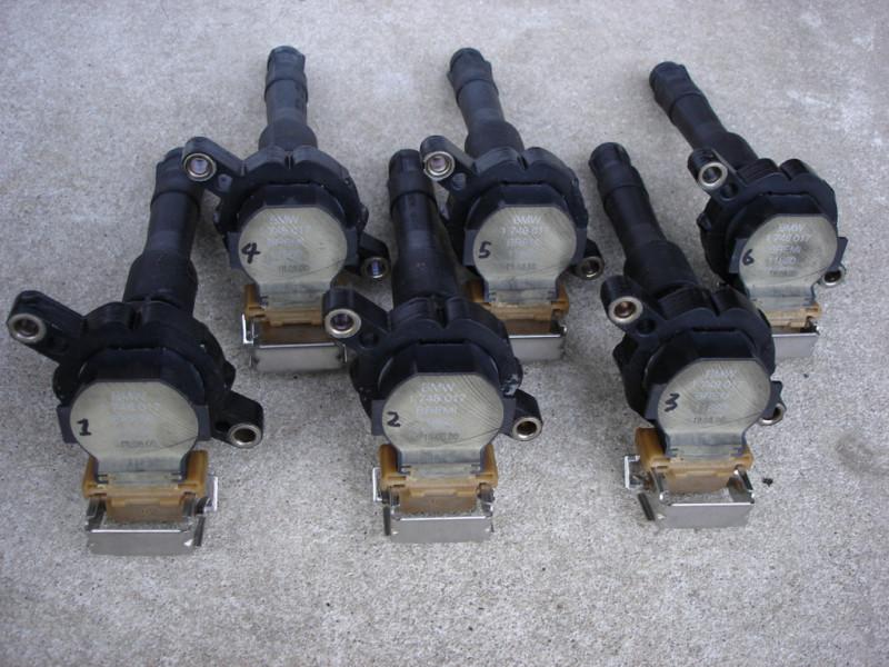 1 set of 6 genuine bmw ignition coil packs 11317480182 and sockets 12139067831 