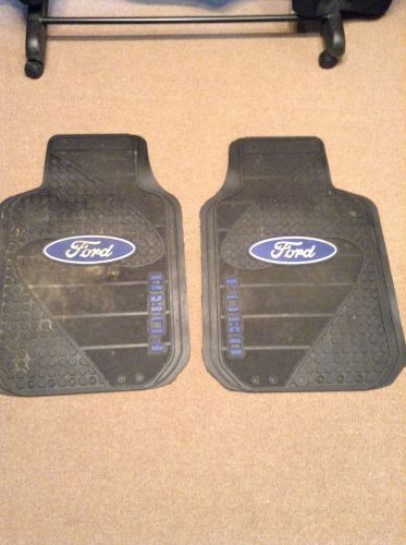 A pair of ford blue oval logo rubber floor area  matts