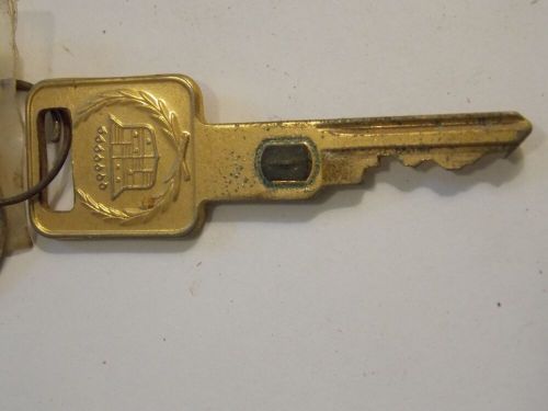 Gold cadillac key with chip