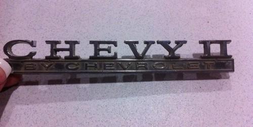 Vintage oem chevrolet chevy ii metal emblem 7745749 ornament