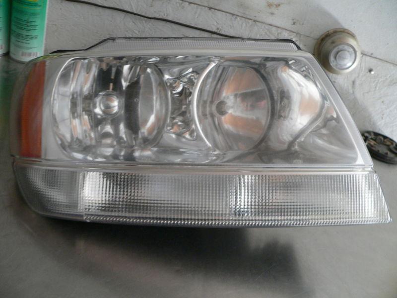 99-04 jeep grand cherokee limited used oem rh headlight right hand overland nice