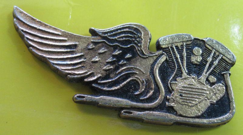 Motorcycle engine on a wing ( hat pin )