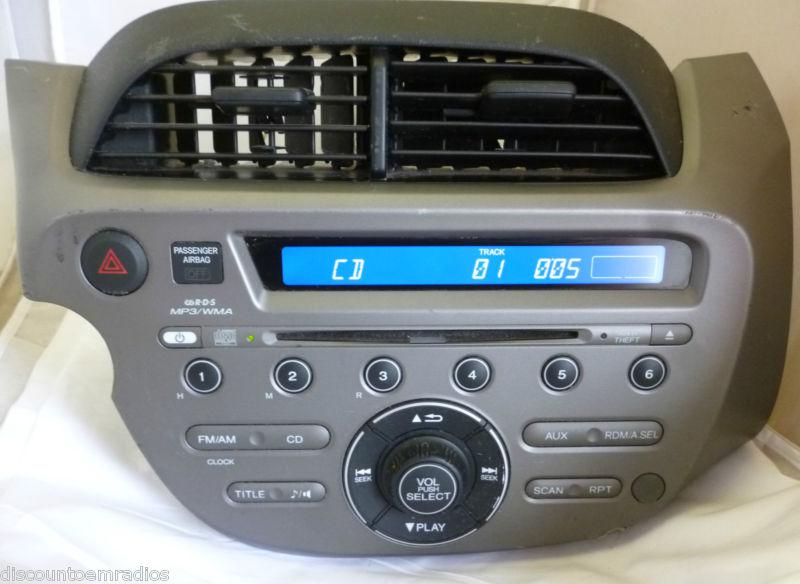 09-11 honda fit radio cd mp3 player & theft code 39100-tk6-a011 *