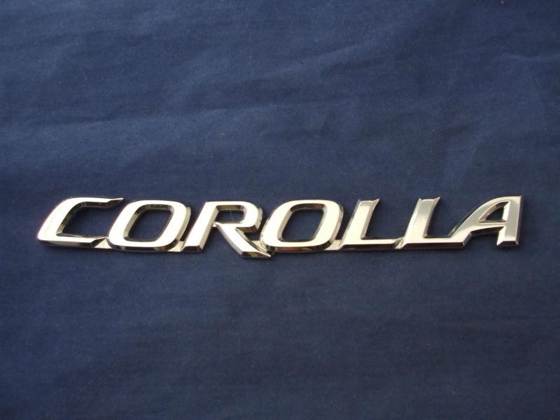 Toyota corolla chrome script emblem 2003-2013 oem badge rear trunk 04 05 06 07