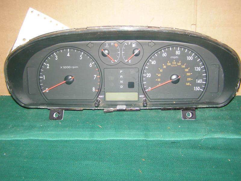 2001 kia optima speedometer cluster  2.4l  4 cyl  at  w/o traction control 