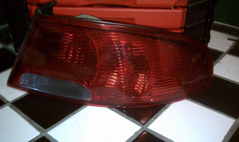 01 02 03 04 05 06 stratus passenger right rear brake side lens tail light lamp