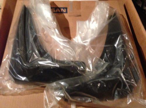 New. old stock. 2000+ nissan xterra front splash guards part number 999j2-kl001