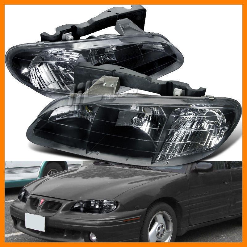 96-98 pontiac grand am black headlights clear lens lh+rh gm2502140 gm2503140