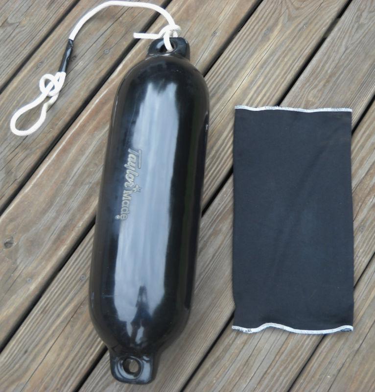 Black taylor made hull gard oval boat fender 6.5”x 23” comes with sleeve & rope