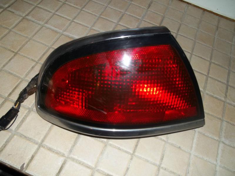 Buy 1997-1999 Buick LeSabre driver side tail light assembly p/n