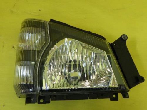 Isuzu elf 2003 right head light assembled [0210800]