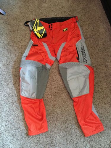 Klim mojave in the boot pant, new, non-current, size 34, orange