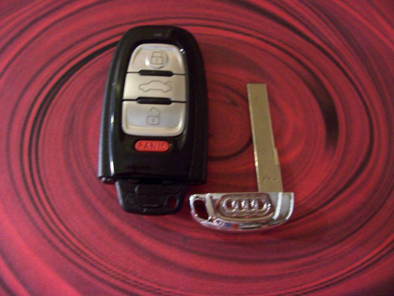 Uncut keyless remote 10-12 audi 4h0.959.754g fcc id: iyzfbsb802