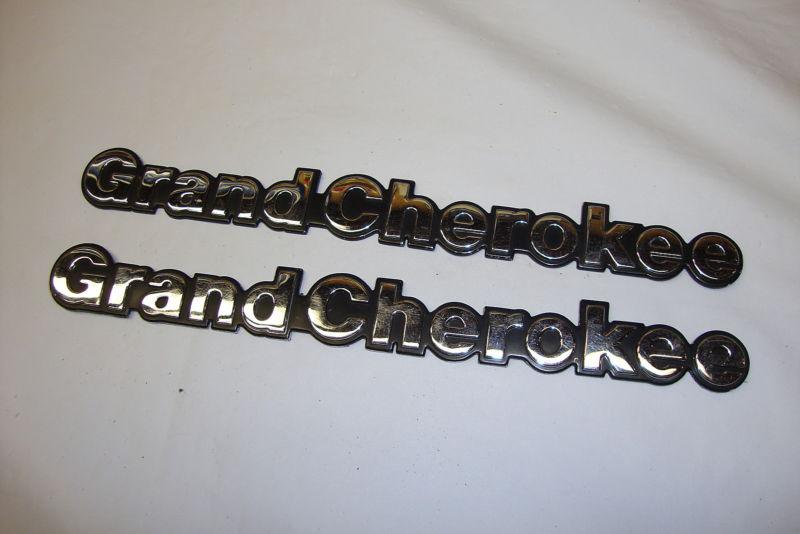 2 jeep grand cherokee chrome emblems oem