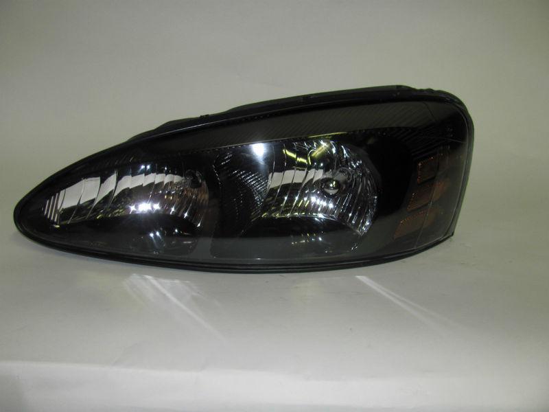 04 05 06 07 08 pontiac grand prix left headlight nice!