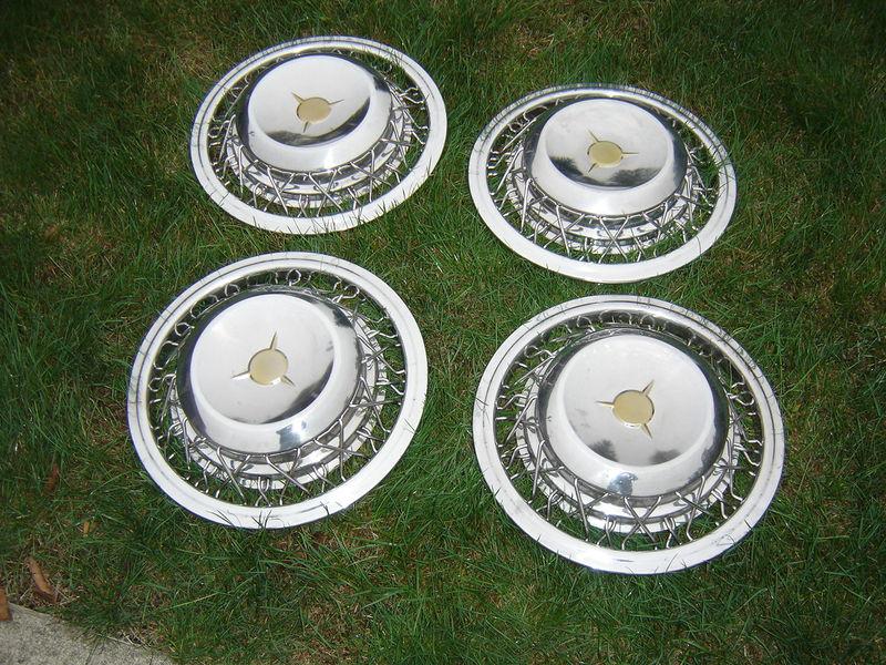 4 older nos wire spoke wheel covers rim hubcaps hub caps mounts to hub quality!!