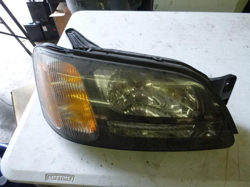 2000 - 2004 subaru legacy outback headlight passenger side (oem)