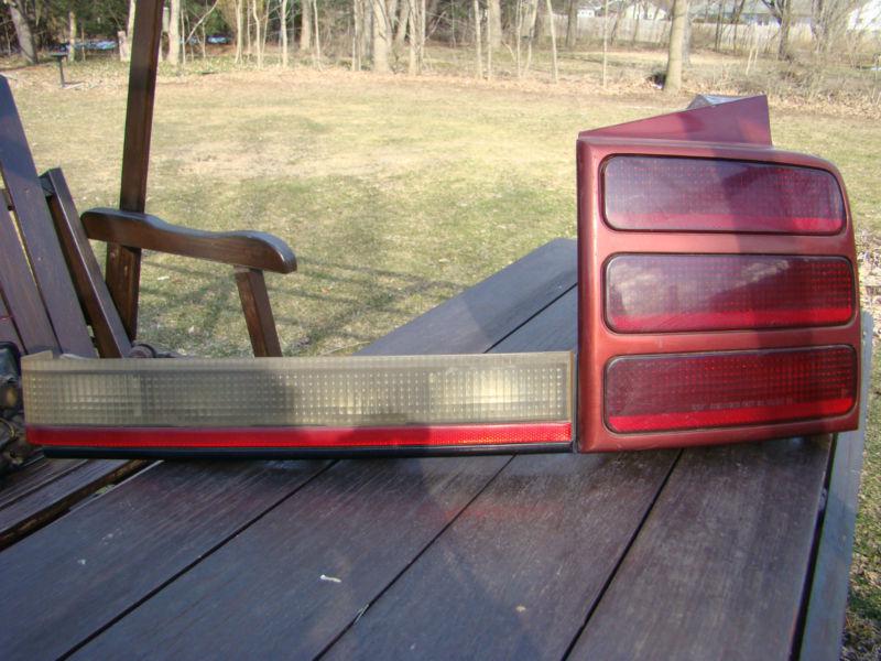 1990 to 1996 olds cutlass ciera tail and backup light right side.