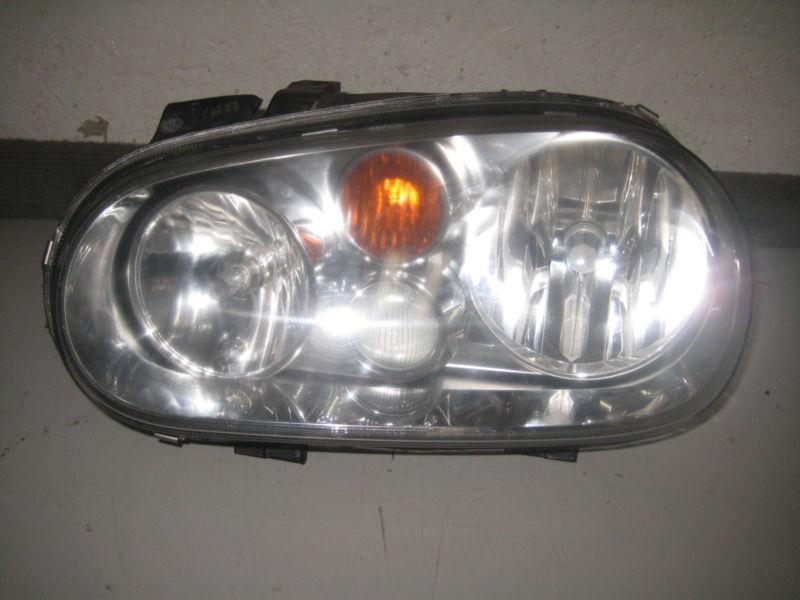 Oem vw golf / gti r32 driver side headlight with fog light 99-05