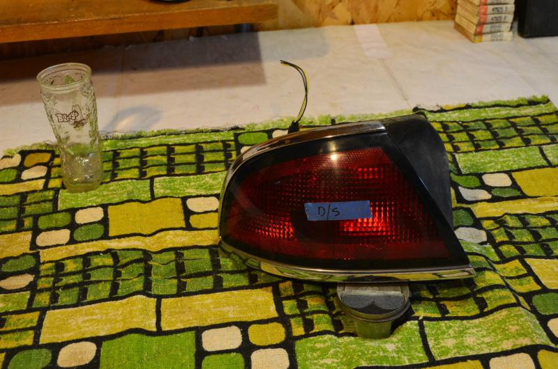 1998 buick, lesabre left hand tail lamp.