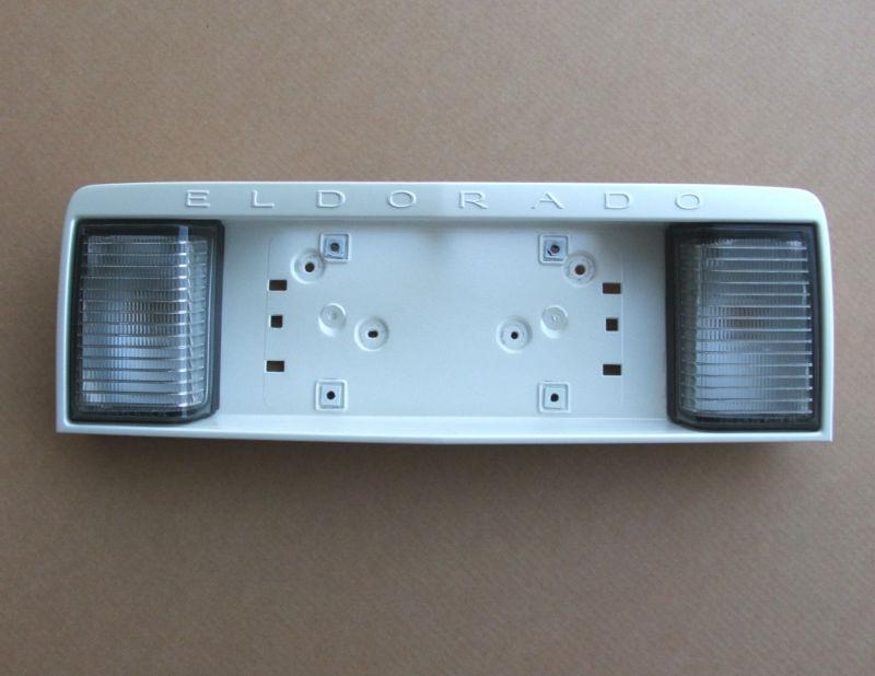 Cadillac eldorado diamond white license plate reverse light panel trim