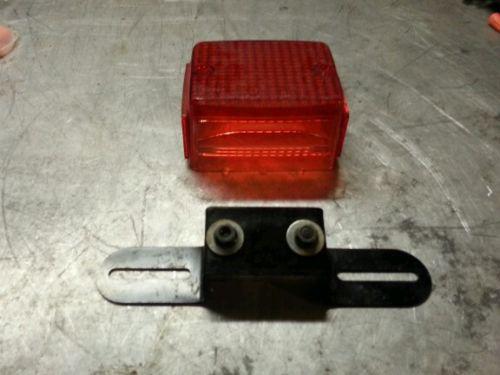 08 suzuki drz 400sm stock brake light & license plate holder