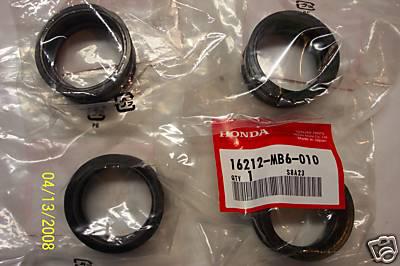 85&86 v65 magna & sabre carb insulators oem new