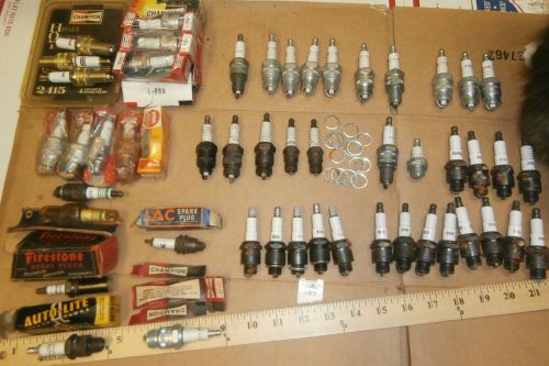 49 mostly n.o.s. spark plugs; champion; autolite; firestone polonium radioactive