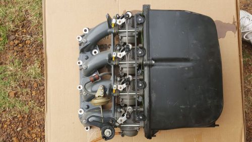 2005 honda ouyboard 75hp manifold with 4 carburators