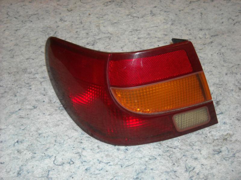 00 01 02 saturn s series tail light lamp l/h