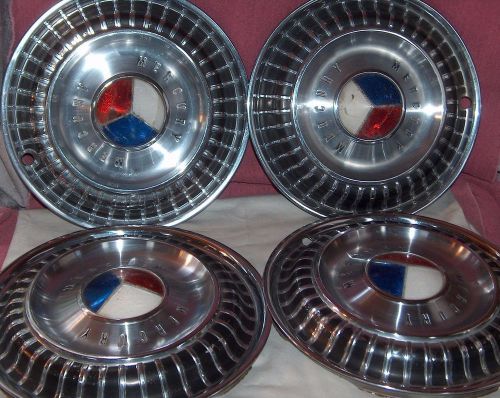 Four matching mercury antique 13&#034; hub caps - red white and blue